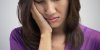 Bouton d'herpès dans la bouche : symptômes et solutions