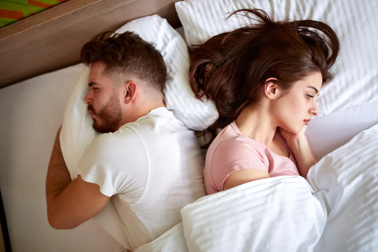 couple with problems in relationship in bed couple with problems in relationship in bed