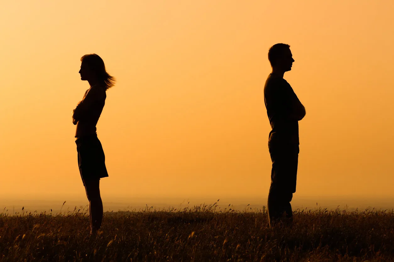 silhouette of a angry woman and man on each other silhouette of a angry woman and man on each other