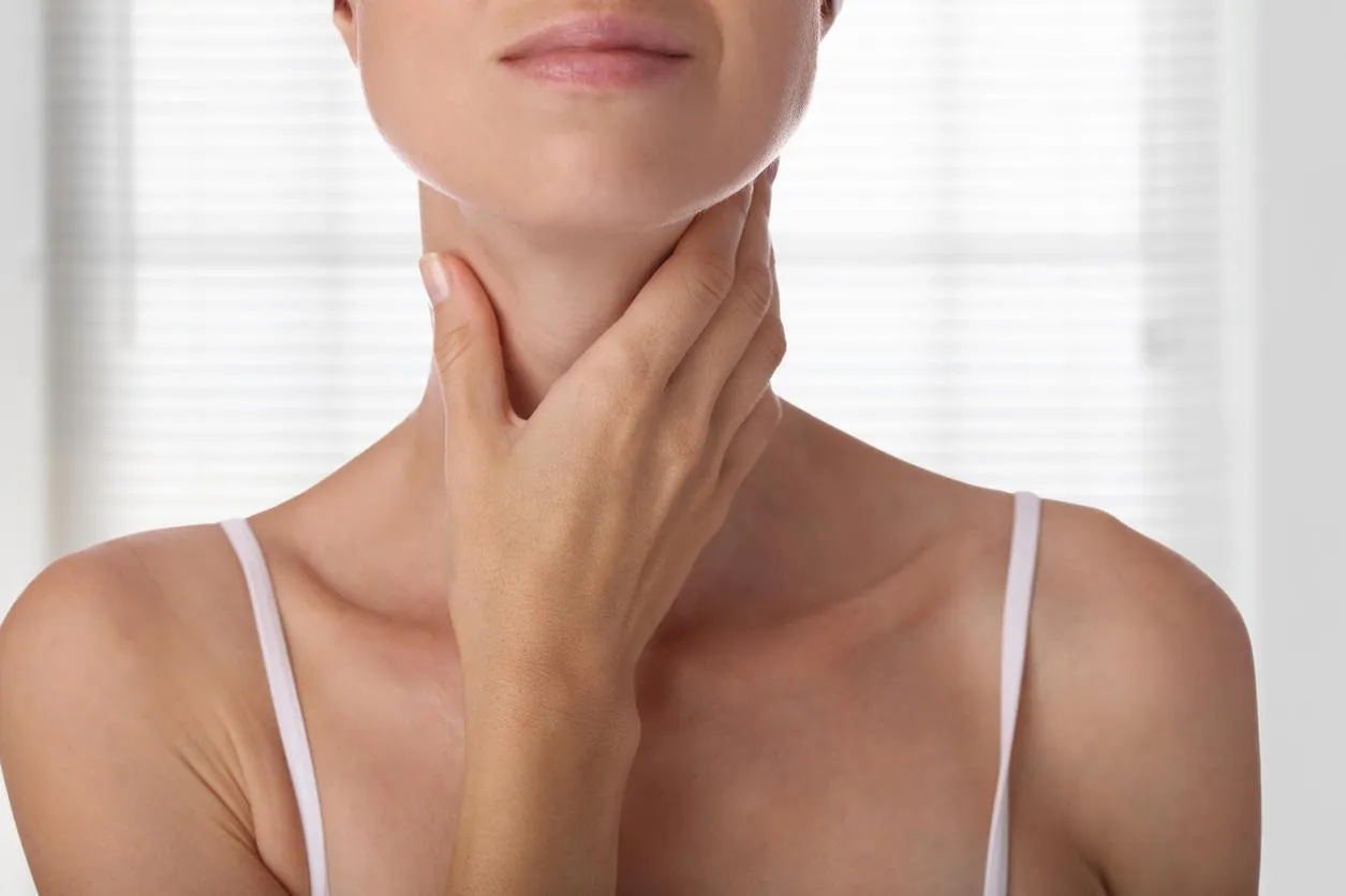 woman thyroid gland control isolated on white background woman thyroid gland control isolated on white background