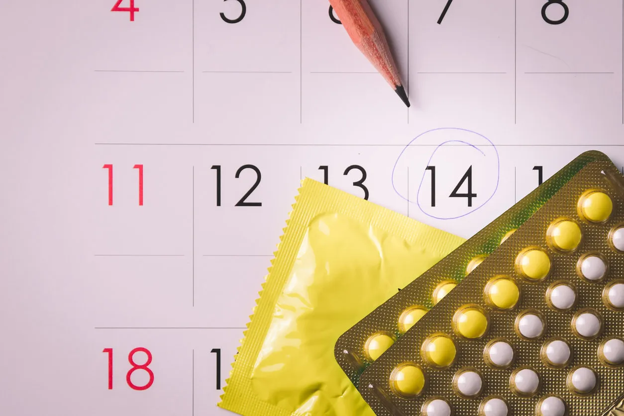 birth control pills on calendar (add vignette tone) birth control pills on calendar (add vignette tone)