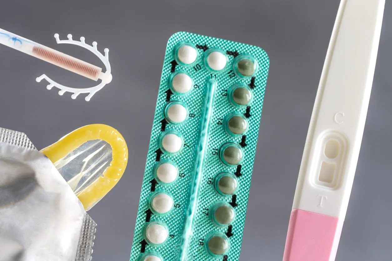 concept with oral contraceptive, emergency pills, injection contraceptive and male condom concept with oral contraceptive, emergency pills, injection contraceptive and male condom
