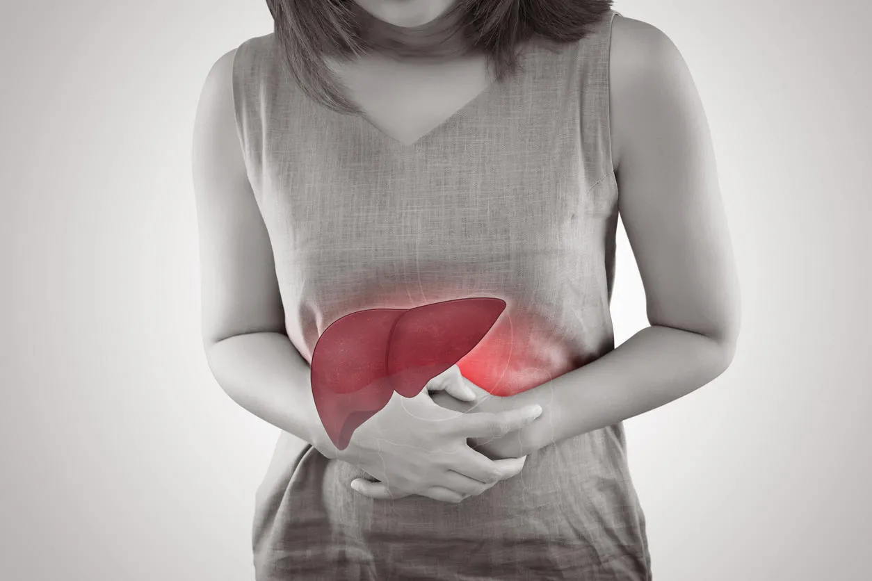 the photo of liver on woman's body against gray background, hepatitis, concept with healthcare and medicine the photo of liver on woman's body against gray background, hepatitis, concept with healthcare and medicine
