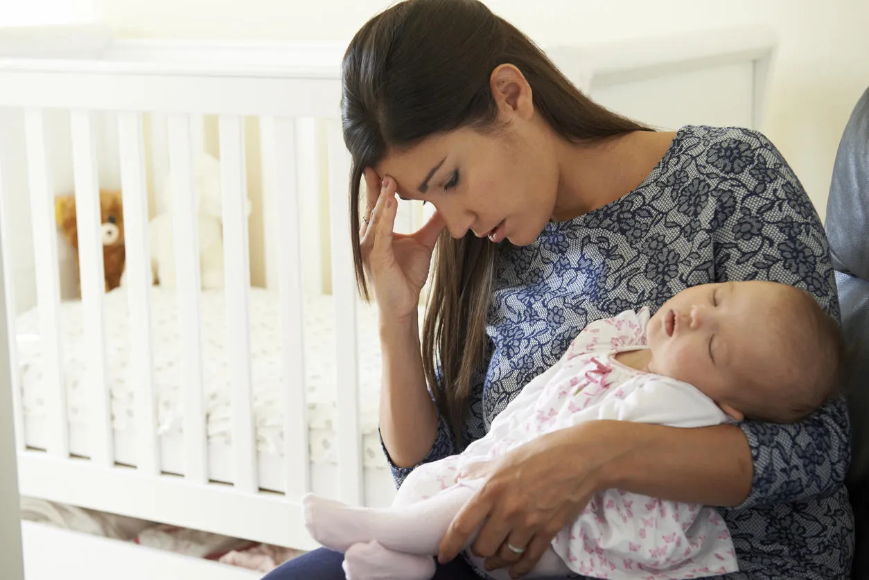 tired mother suffering from post natal depression tired mother suffering from post natal depression