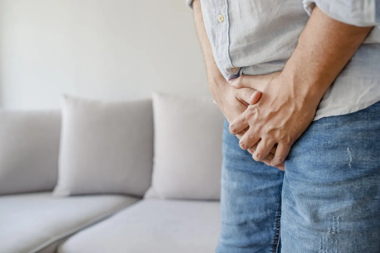 male suffering with pain in the urogenital system disease for men the concept of protection of sexually transmitted infections testicular cancer