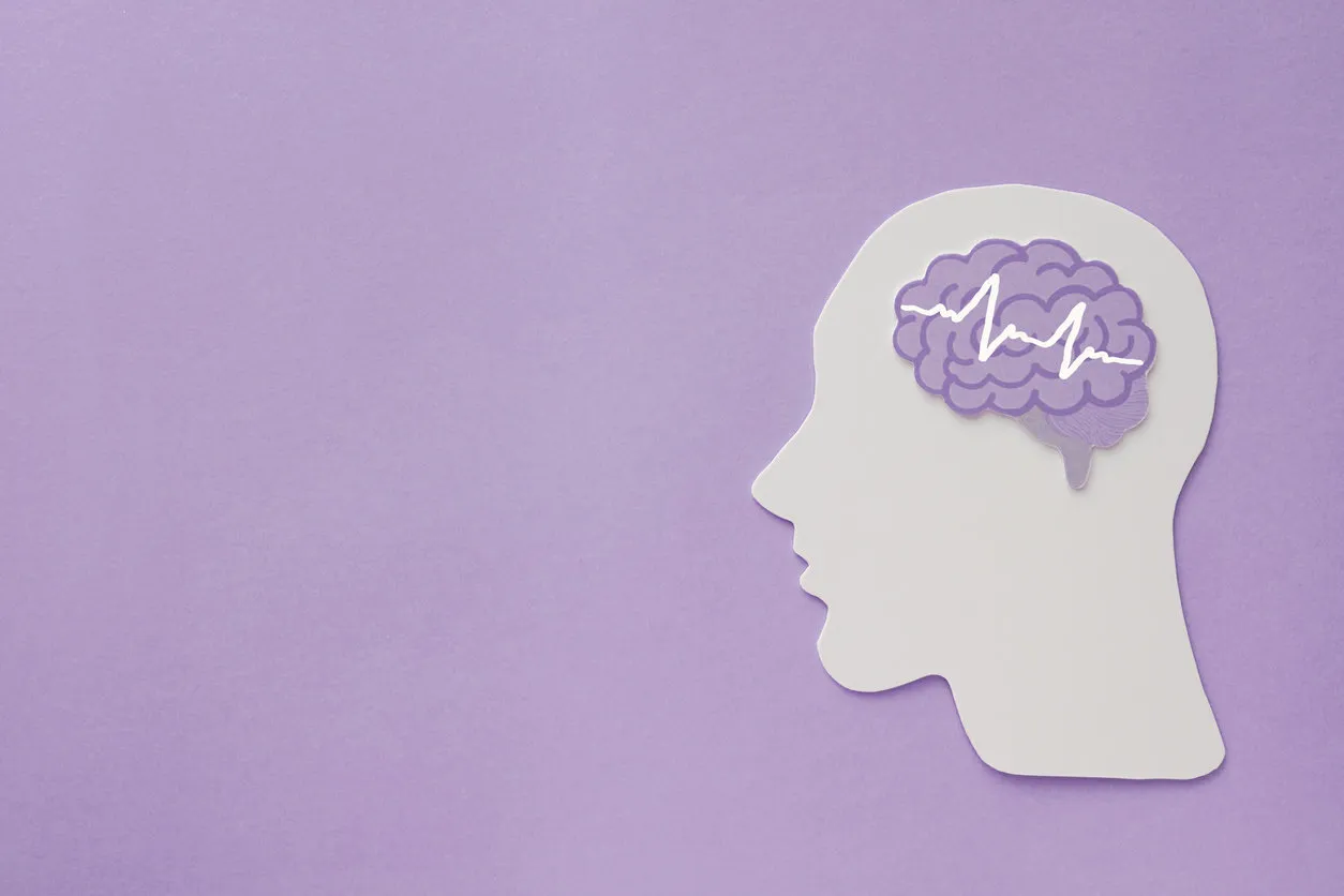 encephalography brain paper cutout on purple background, epilepsy and alzheimer awareness, seizure disorder, mental health concept encephalography brain paper cutout on purple background, epilepsy and alzheimer awareness, seizure disorder, mental health concept