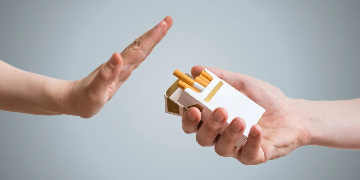 quitting smoking concept hand is refusing cigarette offer quitting smoking concept hand is refusing cigarette offer