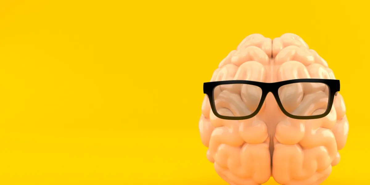 glasses with brain isolated on orange background 3d illustration glasses with brain isolated on orange background 3d illustration