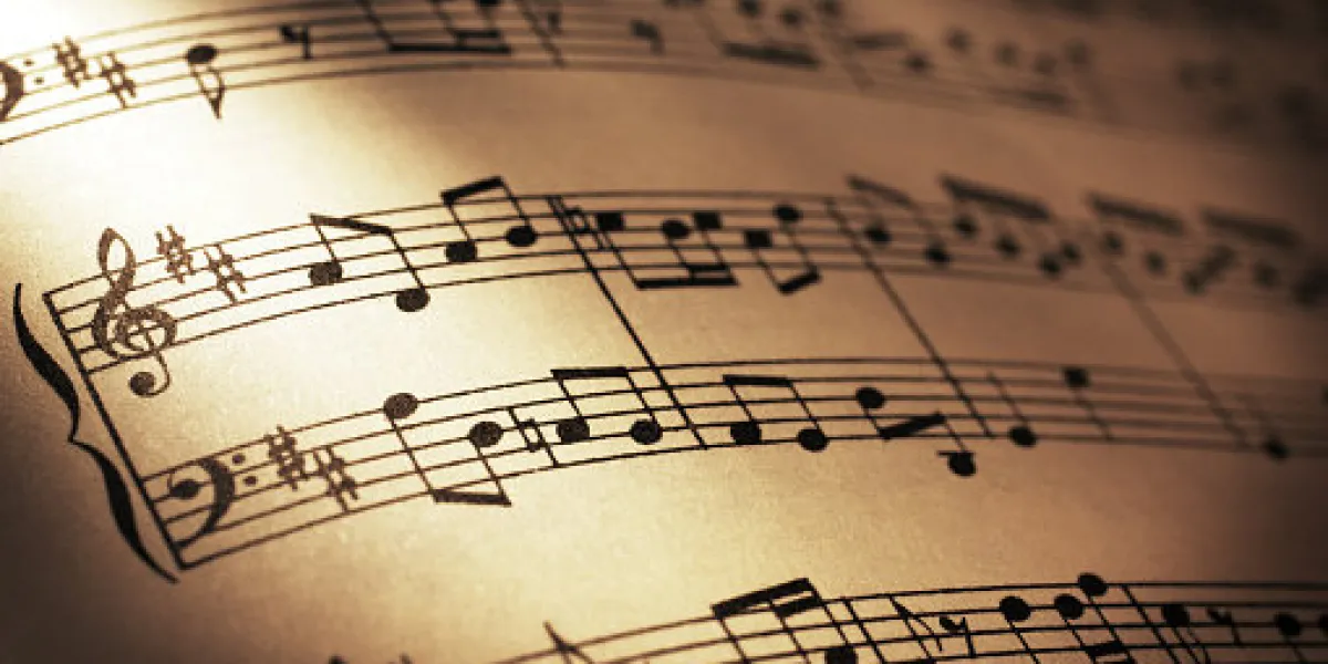 close-up shot of sheet music in sepia tone close-up shot of sheet music in sepia tone