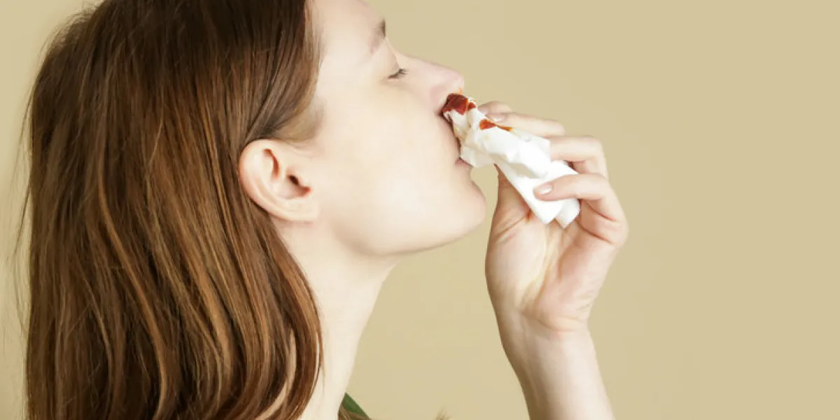 nosebleed, a young woman with a bloody nose healthcare and medical concept close up studio image nosebleed, a young woman with a bloody nose healthcare and medical concept close up studio image