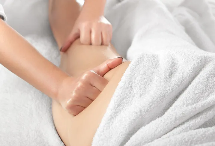 masseur makes anti-cellulite massageon the legs, thighs, hips and buttocks in the spa overweight treatment, body sculptingcosmetology and massage concept masseur makes anti-cellulite massageon the legs, thighs, hips and buttocks in the spa overweight treatment, body sculptingcosmetology and massage concept