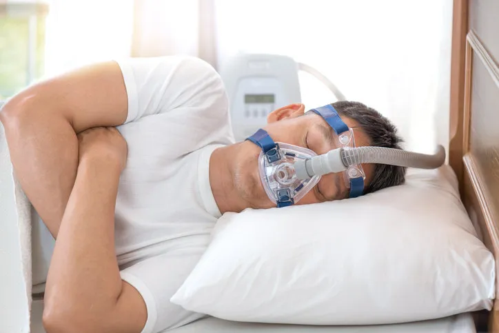 happy and healthy senior man sleeping deeply on his left side without snoring happy and healthy senior man sleeping deeply on his left side without snoring