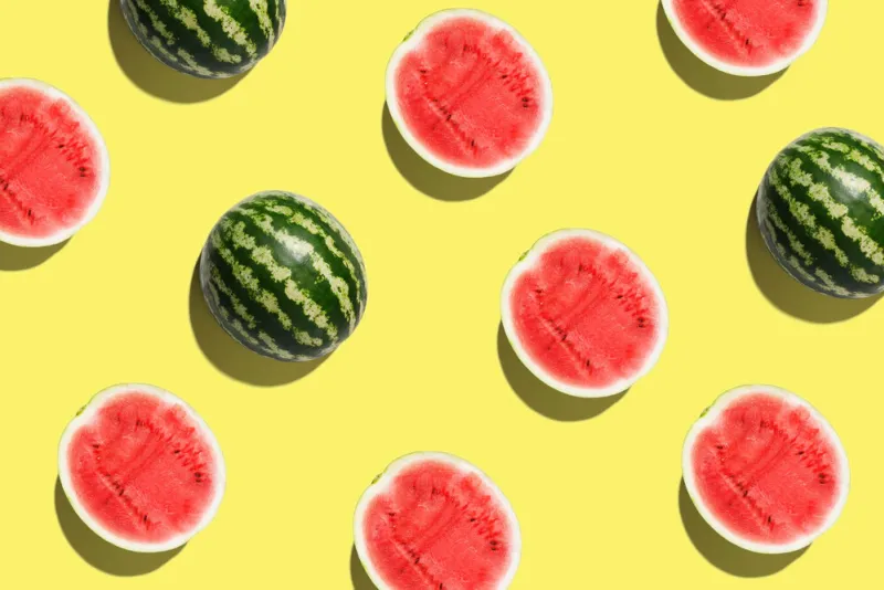 pattern with ripe watermelon on yellow background pop art design, creative summer concept banner half of watermelon in minimal flat lay style pattern with ripe watermelon on yellow background pop art design, creative summer concept banner half of watermelon in minimal flat lay style
