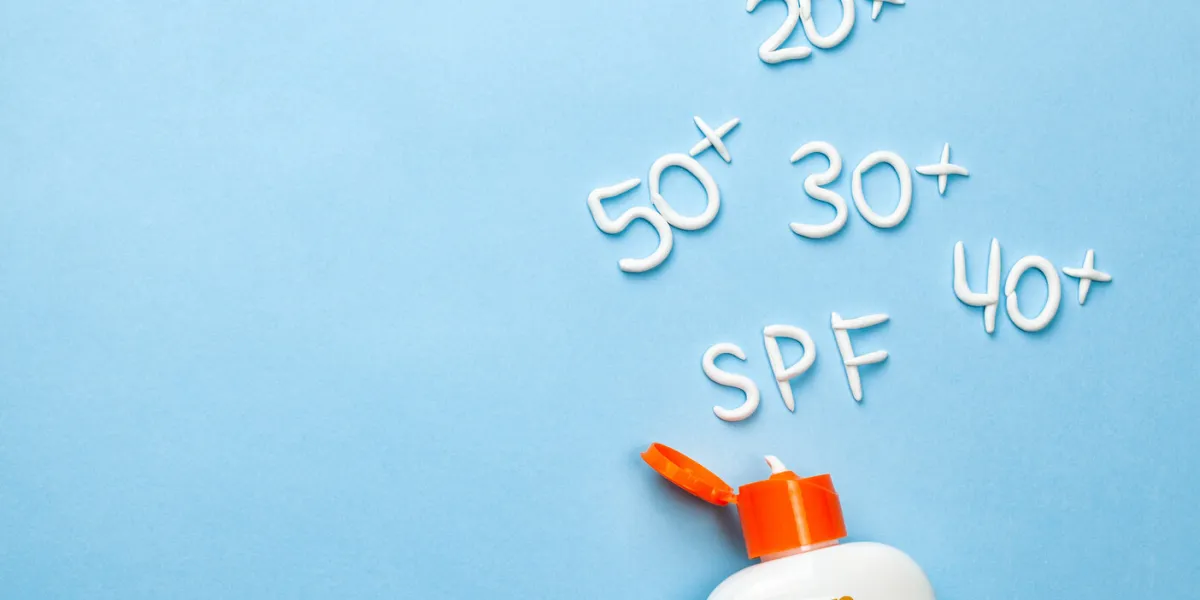 sunscreen how to choose the degree of protection of spf for adults and children cream in the form of question mark and the inscription spf on blue background with white tube concept of how to choose sunblock sunscreen how to choose the degree of protection of spf for adults and children cream in the form of question mark and the inscription spf on blue background with white tube concept of how to choose sunblock