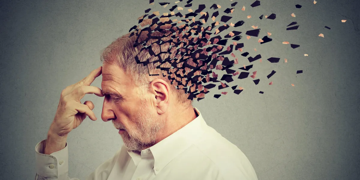 memory loss due to dementia senior man losing parts of head as symbol of decreased mind function memory loss due to dementia senior man losing parts of head as symbol of decreased mind function