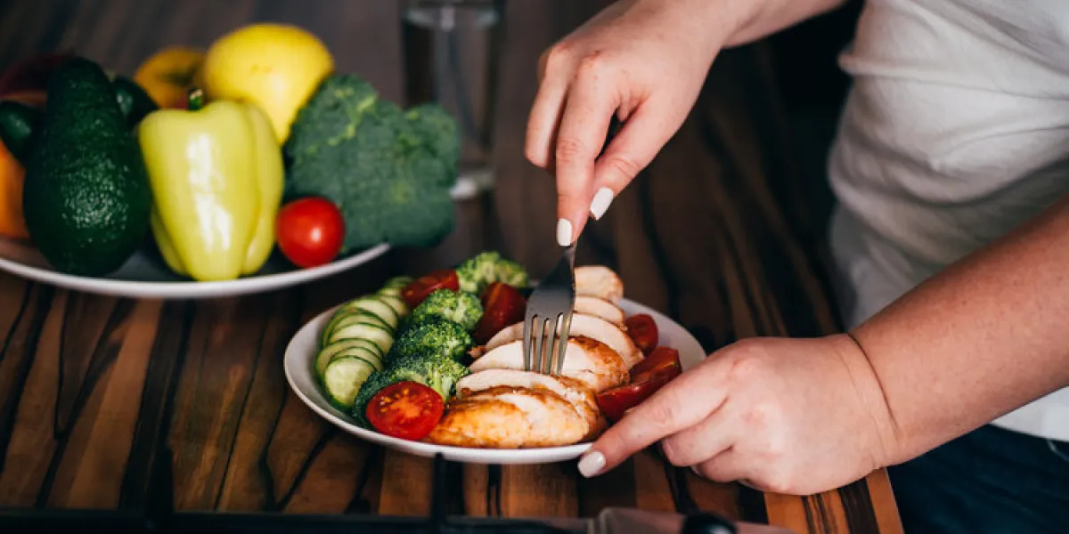diet concept, healthy lifestyle, low calorie food woman dieting closeup portrait of girl eating healthy food