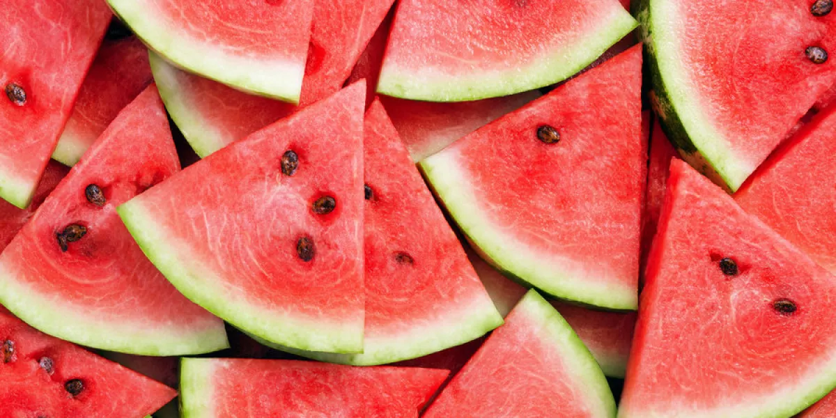 heap of watermelon slices as background