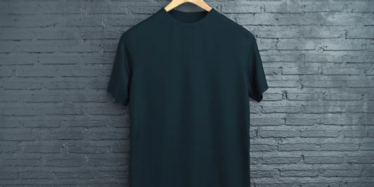 wooden hanger with empty black t-shirt hanging on dark brick background retail concept mock up 3d rendering wooden hanger with empty black t-shirt hanging on dark brick background retail concept mock up 3d rendering