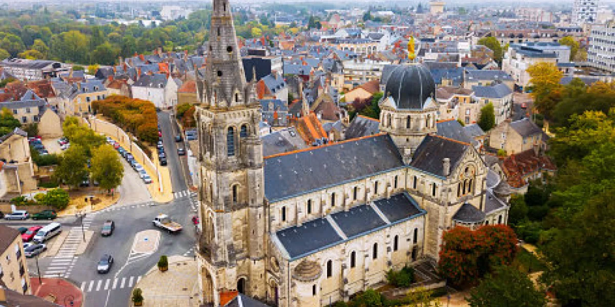 aerial view of picturesque chateauroux cityscape with catholic church of our lady, central france