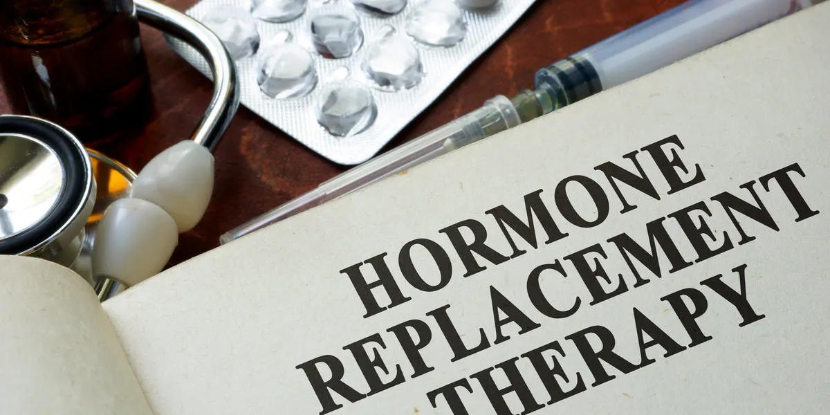 book with words hormone replacement therapy on a table book with words hormone replacement therapy on a table