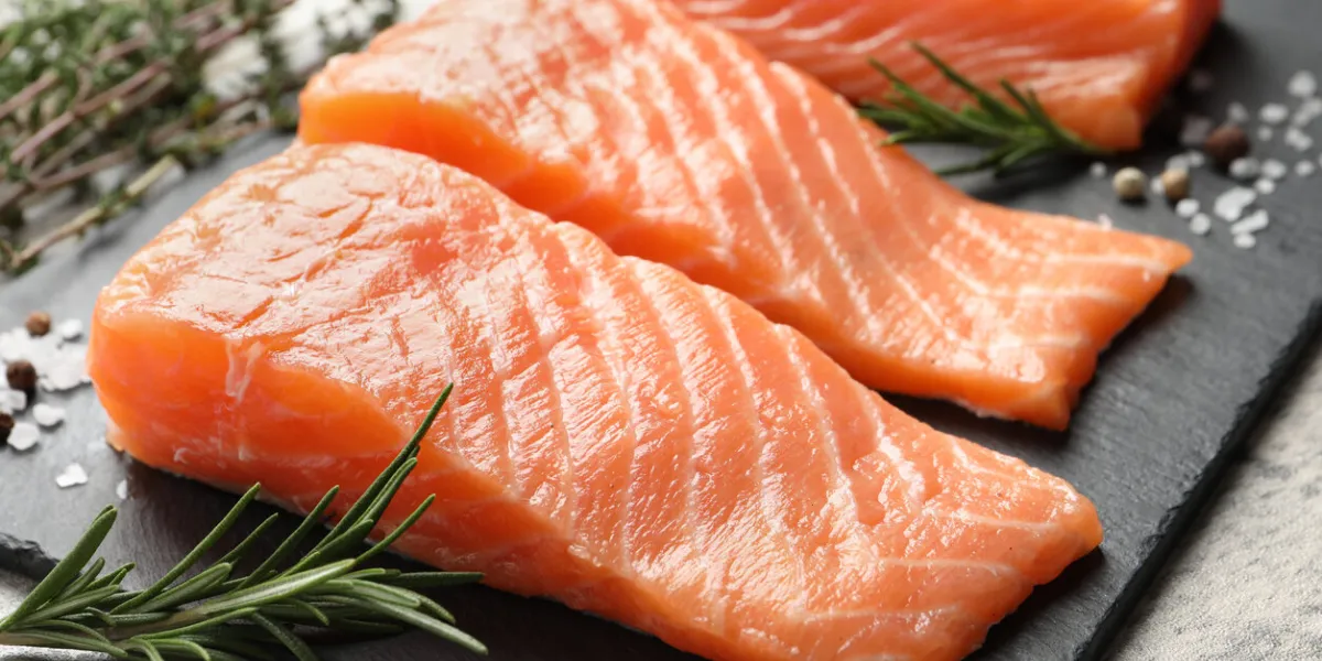 fresh raw salmon and ingredients for marinade on light grey table, closeup fresh raw salmon and ingredients for marinade on light grey table, closeup