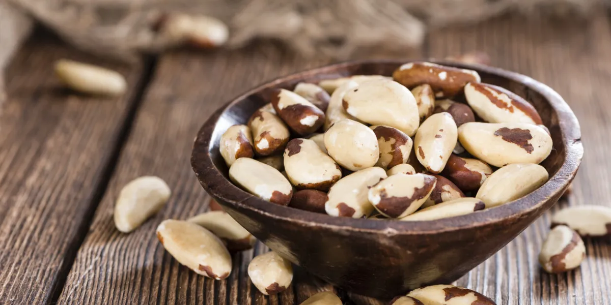 portion of healthy brazil nuts as detailed close-up shot) portion of healthy brazil nuts as detailed close-up shot)