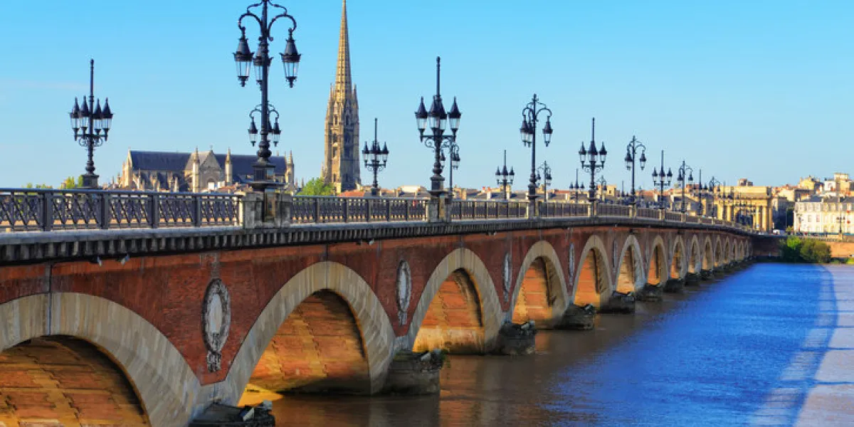 bordeaux river bridge with st michel cathedral in background, france bordeaux river bridge with st michel cathedral in background, france