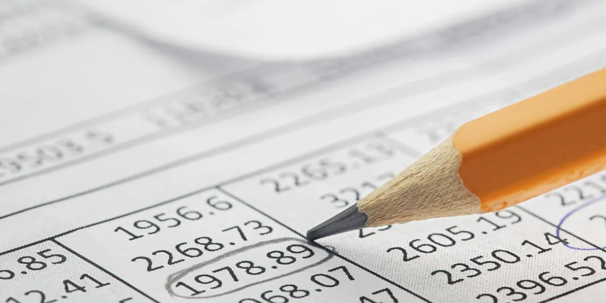 accounting document with pencil, and checking financial chart concept of banking, financial report and financial audit