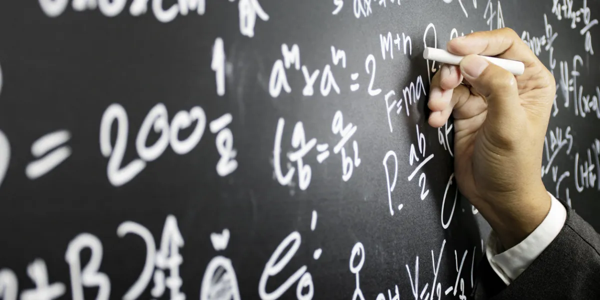 mathematical concepts the teacher explained math problems to students by writing intelligence problems on the blackboard