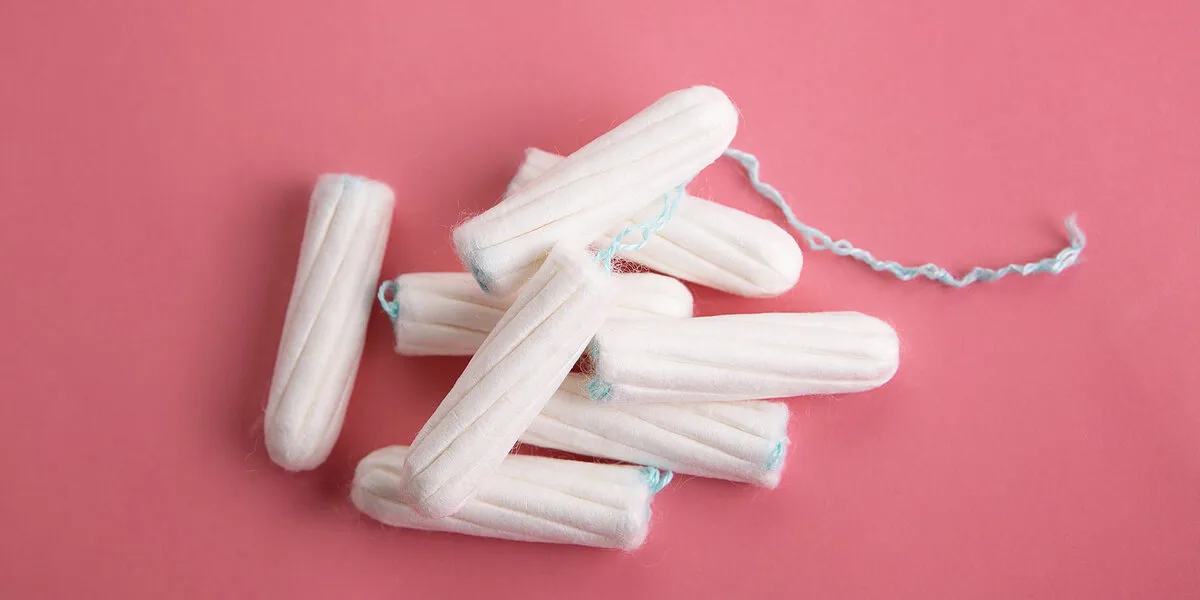 medical female tampon on a pink background hygienic white tampon for women menstruation,protection tampons