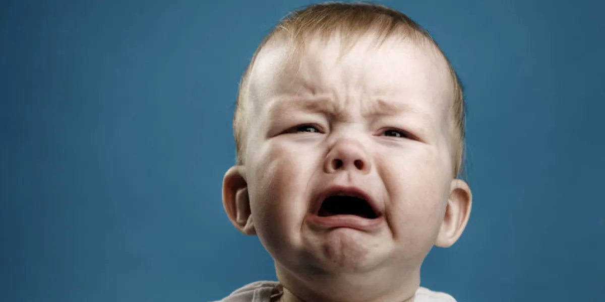 photo of nine month baby crying, isolated photo of nine month baby crying, isolated