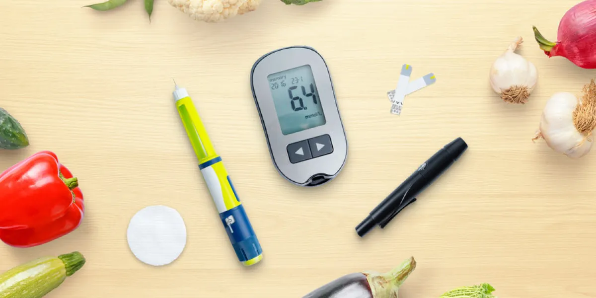diabetes concept composition with blood glucose meter and insulin surrounded by healthy food, vegetables top view, flat lay
