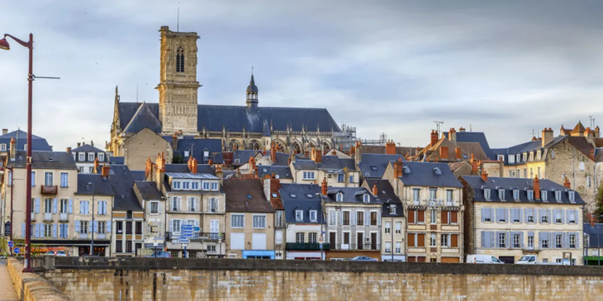 view of nevers from loire river bridge, france