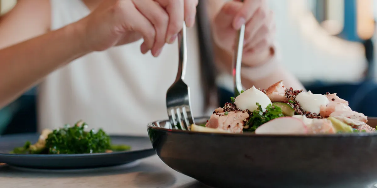 woman enjoy the salad in restaurant woman enjoy the salad in restaurant