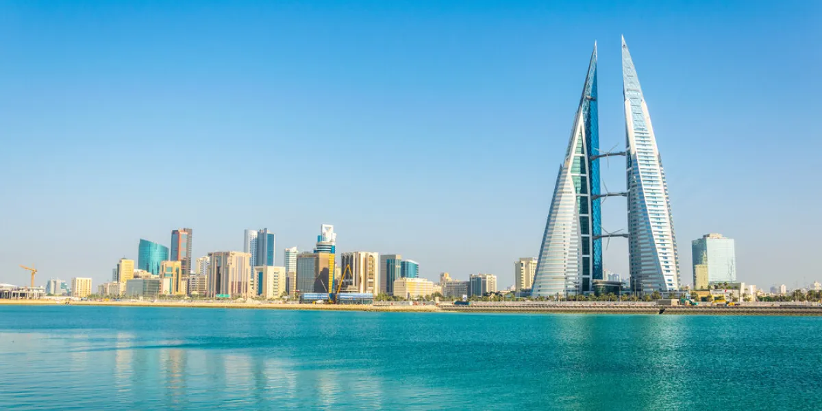 skyline of manama dominated by the world trade center building, bahrain skyline of manama dominated by the world trade center building, bahrain