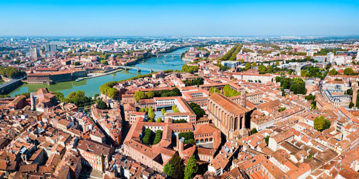 toulouse and garonne river aerial panoramic view toulouse is the capital of haute garonne department and occitanie region in france toulouse and garonne river aerial panoramic view toulouse is the capital of haute garonne department and occitanie region in france