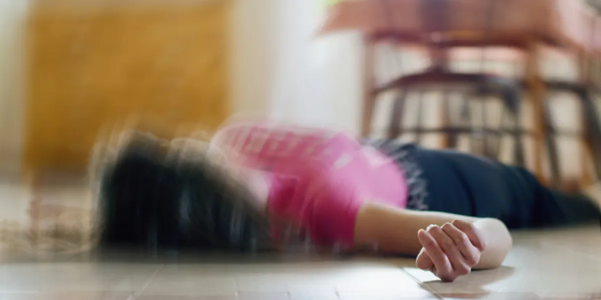 woman lying on the floor at home, epilepsy, unconsciousness, faint, stroke, accident or other health problem, healthcare and medical concept woman lying on the floor at home, epilepsy, unconsciousness, faint, stroke, accident or other health problem, healthcare and medical concept