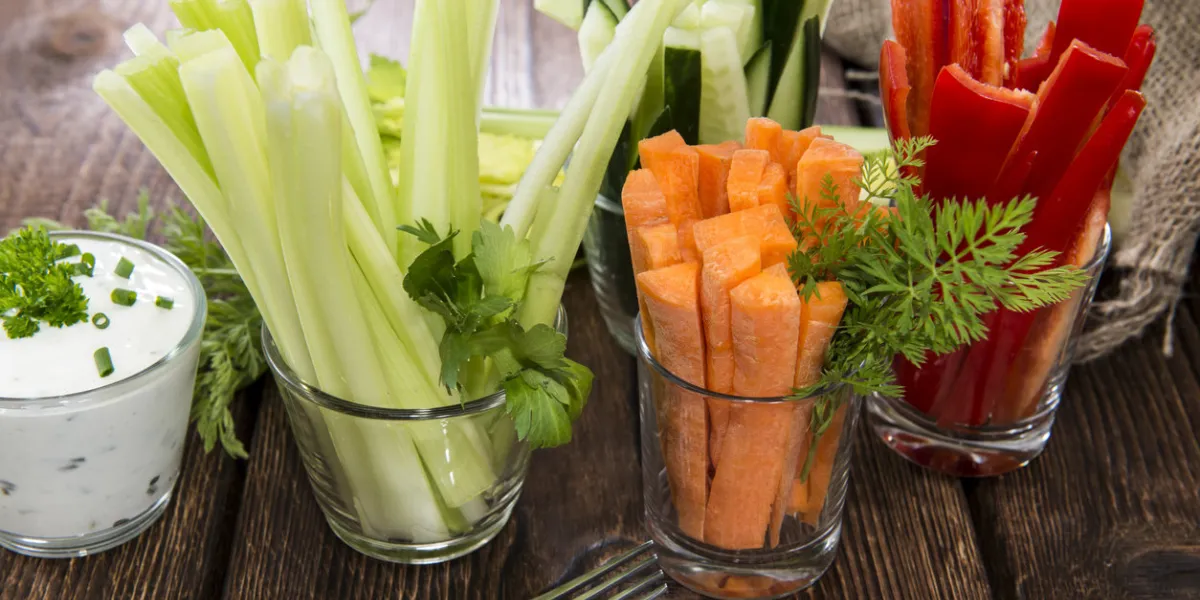 fresh vegetables in clear glasses and white dip fresh vegetables in clear glasses and white dip