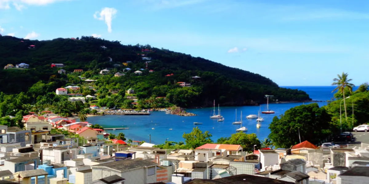 guadeloupe is a french island in the caribbean with magnificent beaches, a tropical forest and a volcanodeshaies is a small town on the northwestern shore of basse-terre, where nice beaches are located guadeloupe is a french island in the caribbean with magnificent beaches, a tropical forest and a volcanodeshaies is a small town on the northwestern shore of basse-terre, where nice beaches are located