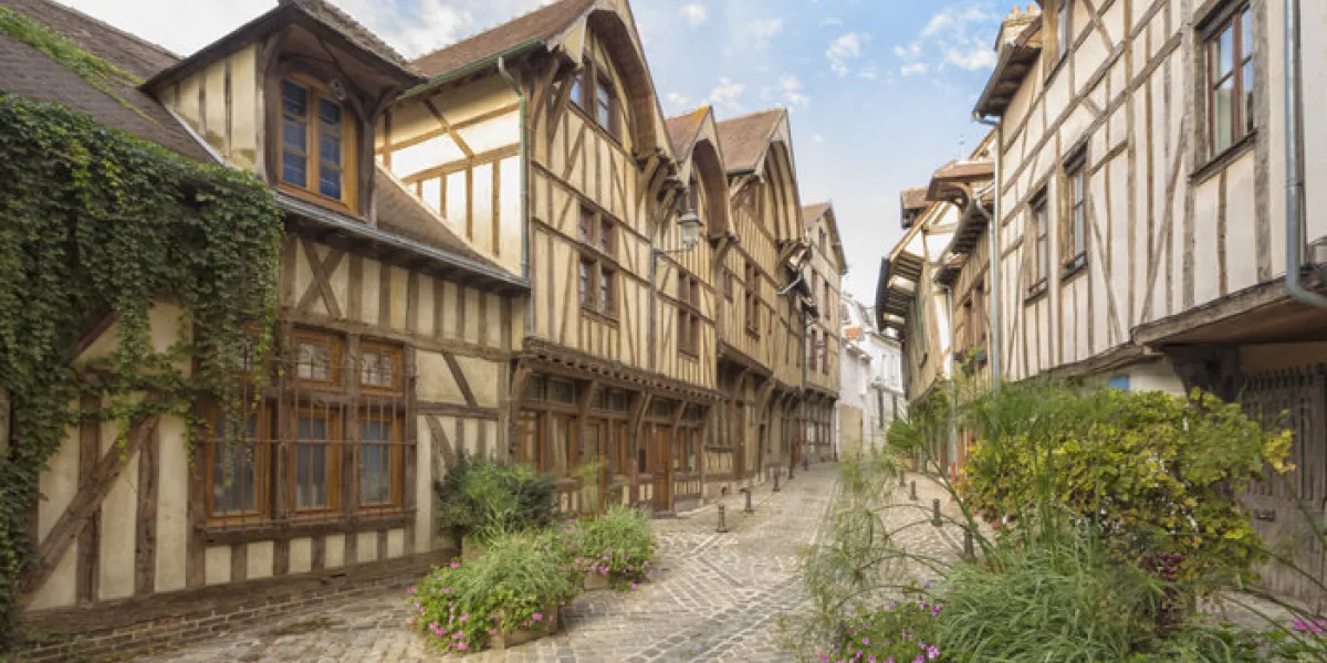 half-timbered houses on alley at the old town of troyes, champagne-ardenne region, france half-timbered houses on alley at the old town of troyes, champagne-ardenne region, france