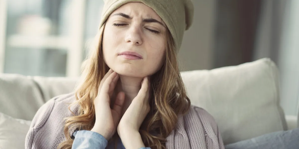 young woman suffering from cold