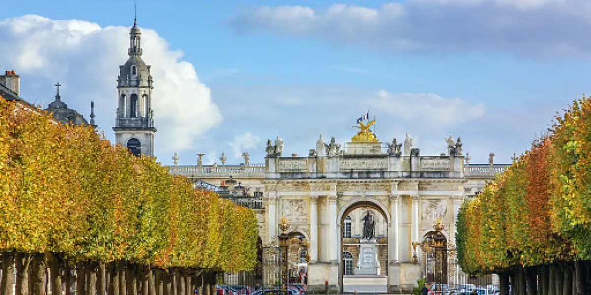 view of alley and arch here in nancy, france view of alley and arch here in nancy, france