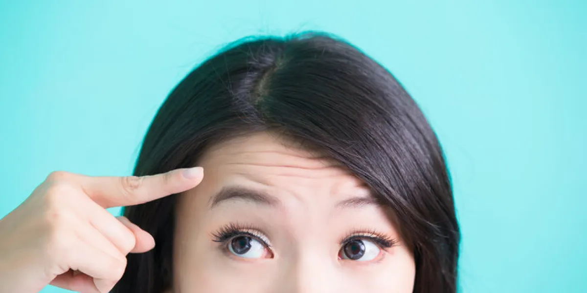 beauty skincare woman with wrinkle problem on green background beauty skincare woman with wrinkle problem on green background