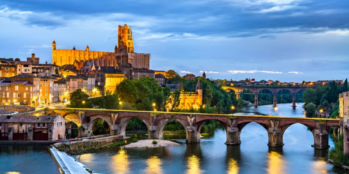 albi featuring the sainte-cecile cathedral and the old bridge over the river tarn unesco world heritage in france