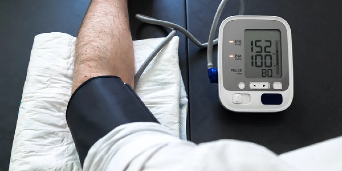 man self-monitoring of blood pressure with a tensiometer hypertensive patient performing a blood pressure auto test man self-monitoring of blood pressure with a tensiometer hypertensive patient performing a blood pressure auto test