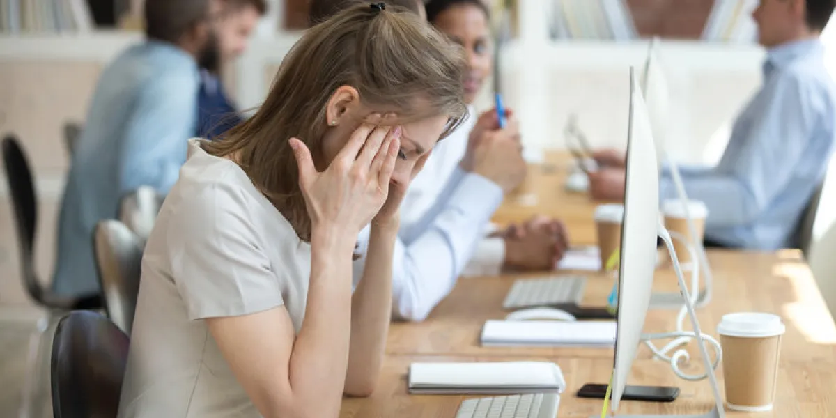 sick woman distracted from work feeling unwell sitting in front of computer, stressed female employee have anxiety attack at workplace, upset woman suffer from headache or dizziness in office