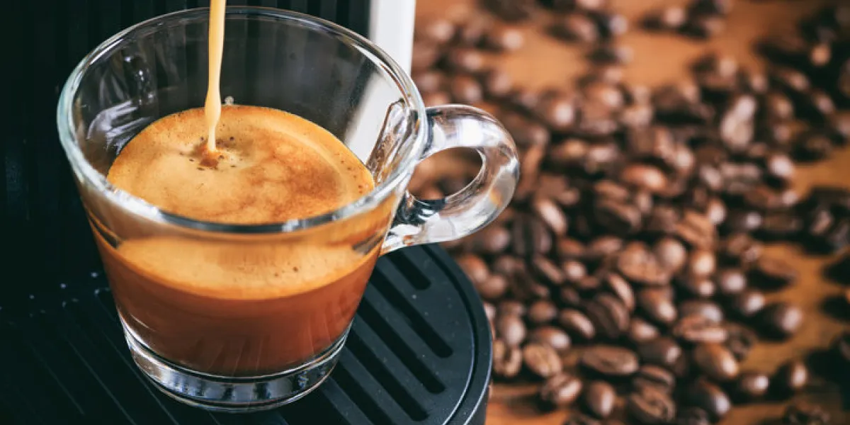 espresso coffee preparation on a wooden table