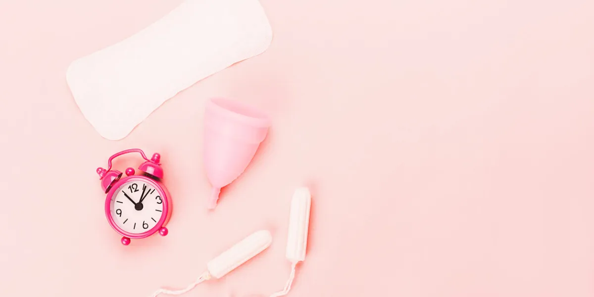 various sanitary products on pastel pink background pad, menstrual cup, tampons perion concept flat lay, top view copy space various sanitary products on pastel pink background pad, menstrual cup, tampons perion concept flat lay, top view copy space