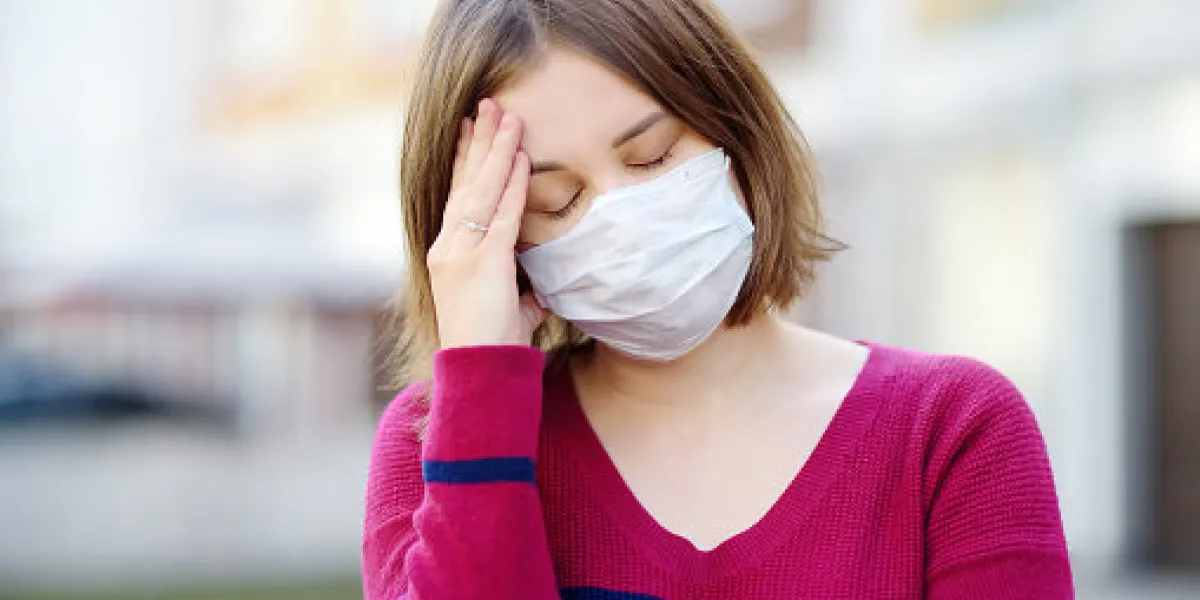 young woman wearing a protective mask in public place safety during covid-19 outbreak pandemic of coronavirus young woman wearing a protective mask in public place safety during covid-19 outbreak pandemic of coronavirus