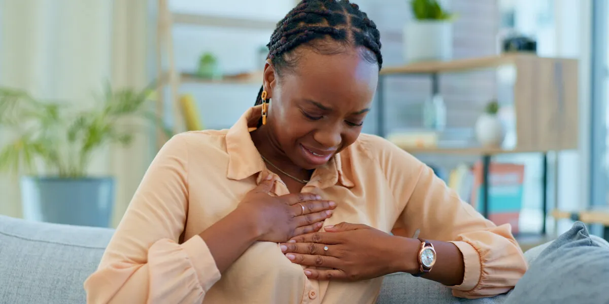 black woman, chest pain and heart attack with health at home, emergency and breathing issue with indigestion respiratory, pneumonia or tuberculosis, lungs or cardiovascular healthcare or anxiety black woman, chest pain and heart attack with health at home, emergency and breathing issue with indigestion respiratory, pneumonia or tuberculosis, lungs or cardiovascular healthcare or anxiety